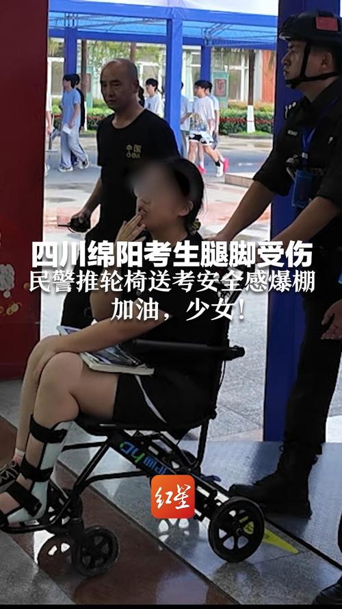 北京人大附中分校_卞亦博輪椅送考_人大附中高考送考